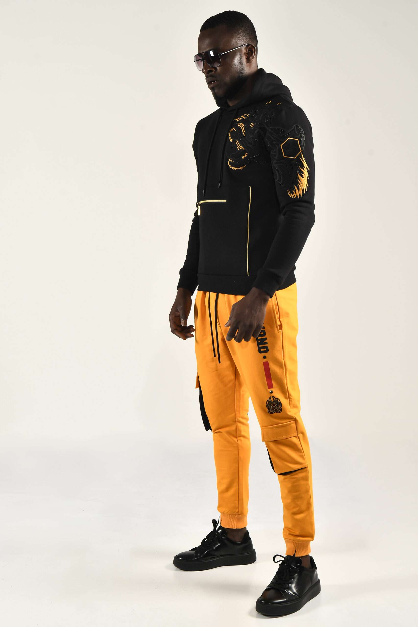 Calvano Men's Yellow Jogger Pants with Bold Logo and Bear Paw Design Standout Streetwear Style - Image 2